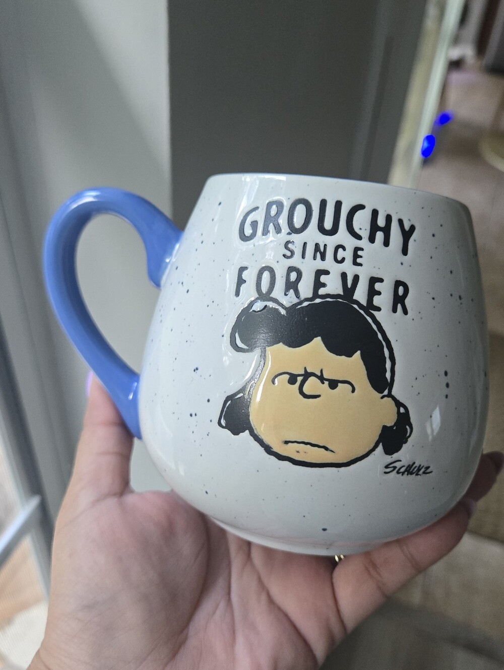 Peanuts Lucy 'Grouchy Since Forever' White Speckled Mug with Blue Handle 20 Oz